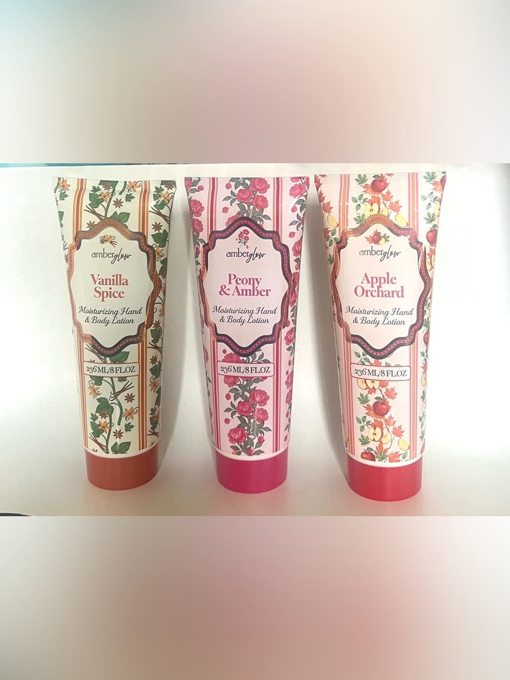 Amber glow: Peony/Amber / Apple Orchard Moisturizing Hand & Body Lotion.